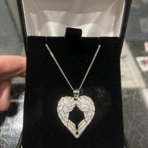 Sterling silver and cubic zirconia wings heart pendant