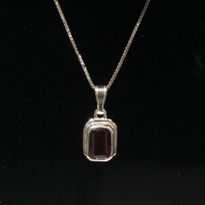 Sterling silver and garnet pendant